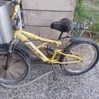بايسكل BMX اصفر حجم ٢٤ للبيع  نضيف بس نفخ دايرات بريك خلفي السعر ٧٥ وب...