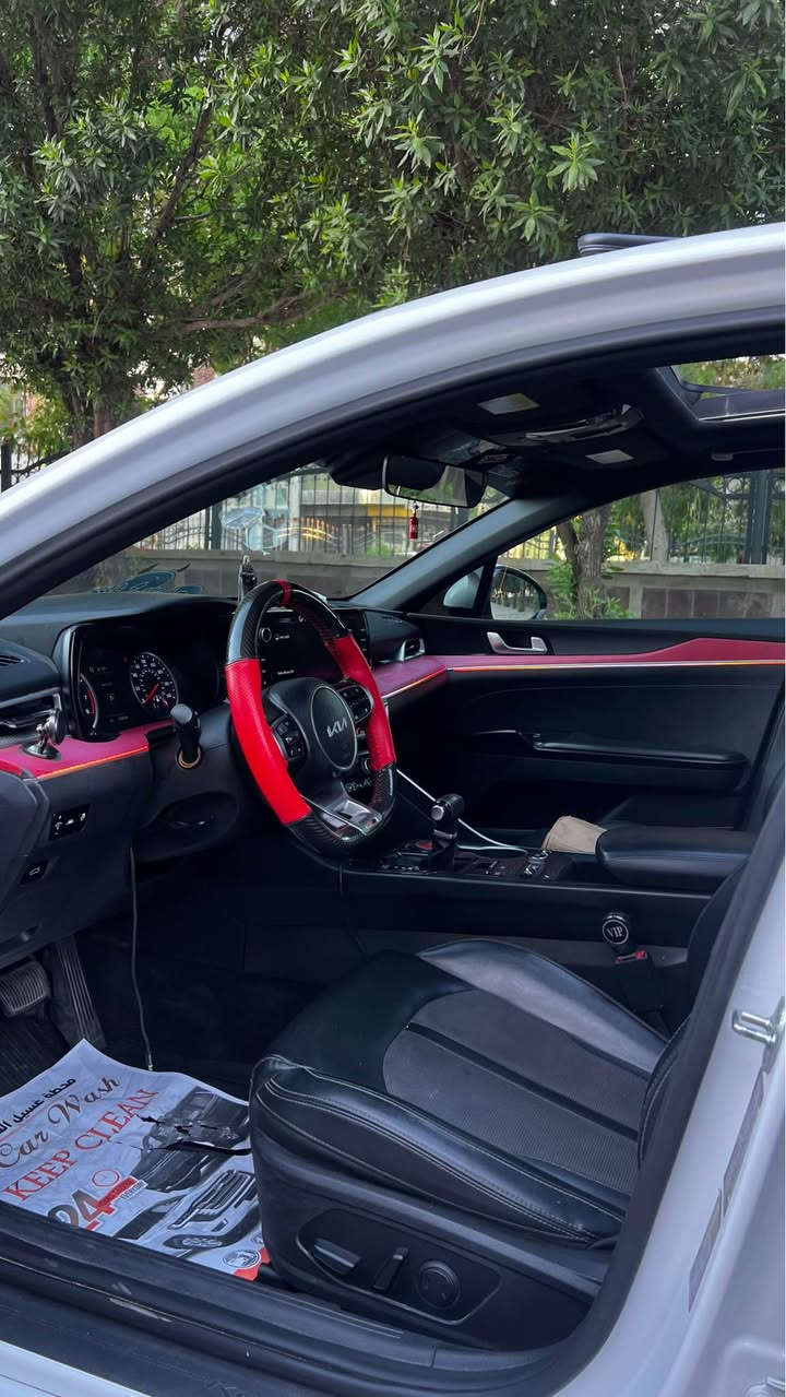 سلام عليكم
Kia k5 gt line 1.6 torbo

نضام الدفع AWD
موديل 2022
فول مواصفات 
بصمه تشغيل 
بصمه دخول بابين ذكيه صندوق ذكي 
بانوراما فتحتين 
رادار امامي 
كامره بالجامه تحديد المسار 
رادارات خلفيه نقاط عمياء 
اشاير بالمري وتدفئه بالمرايه 
6 عدسات اماميه 
لد نهاري برتقالي 🟠
بلوجكترات اماميه 
لد لخلفي مسطره 
ويل حجم 18 
شاشه كبيره تحكمات القياده من داخل الشاشه
كشنات جلد اسود 
كشنات كهرباء 
تدفئة كشنات 
تدفئة ستسرن 
ستيرن حرف D رياضي كاربون 
نفكيشن 
اوتو هولد 
سايد بريك دكمه 
شحن لاسلكي 
مع مخارج شحن جارج فاست تدعم ابل كار بلي واندرويد اوتو مع منافذ شحن خلفيه 
داخل اسود بالكامل 

 الاضافات والتزويد 
المكينه عليه بلكات ريسنك 
نوزلات ريسنك 
مجاول ريسنك 
توربو اكبر 
وعطاس توربو 
برمجه سيفتي 
سستم اكزوز كامل بورلا اتاك 
سبيسرات 4 
وايد بدي كامل موجود 
كت لحايه ودوس ودفيوزر وزعانف اصلي 
سكوب جامه خلفي مري باتمان 
سبايدر خلفي اصلي 
اناره محيطيه متحركه اكثر من 100 مود
ارضيات ريزلاين اصليات 
وبعد هواي نواعم 

ضرر بنيد مصلح نفسه وكلير جاملغ وباب خلف السايق وبارد بالباب الي خلف الراكب مصلح تصليح مضبوط كفاله دواخل 
افحص سونار وين ما يعجبك 

السعر 183$ وبيه مجال بسيط مصروف عليه اكثر من هذه الرقم 

للاستفسار 0️⃣7️⃣8️⃣1️⃣0️⃣6️⃣1️⃣4️⃣4️⃣2️⃣9️⃣
*********** واتساب بغداد, العراق
