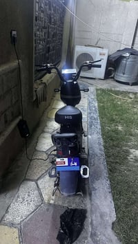 دراجه شحن كامله وضمان بيهه شهر  السعر 200   الف قفل   موبايل 077194562...