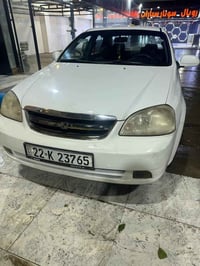 اوبترا 2012 بدون ضرر رقم اربيل باسمي جديد تحويل ثاني يوم  لون ابيض   س...