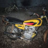 دراجة نارية • مكفولة مكينة • موديل ٢٠