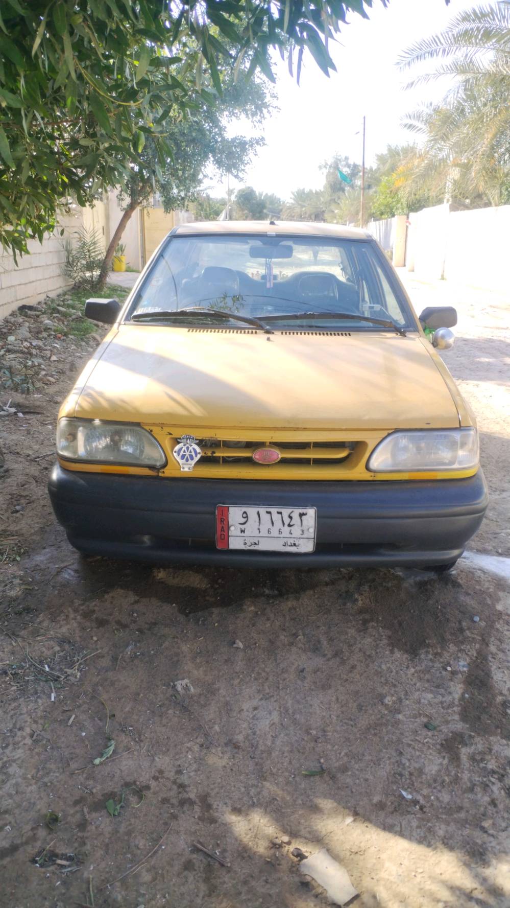 السياره موديل 2014 كير ومكينه وكلچ مكفول تبريد وتدفئة شغال هيئة وغرامة مصفرة موقع السياره بغداد الشعب 