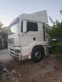مان 2003 رقم بغداد انكليزي سنويه جديده كير اوتماتيك محرك بم ونوزل ثلاج...