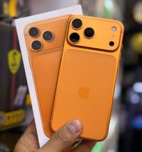 عندي ايفون ١٧ بر ماكس ذاكرة ٢٥٦ لون برتقالي شرق اوسط جديد بل كارتون بع...