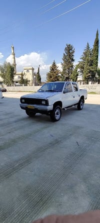 نيسان بكب • ٢٠٠٢ • دبل