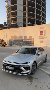 هونداي سوناتا هايبرد للبيع  موديل السياره 2024  وارد امريكي اللون سلفر...