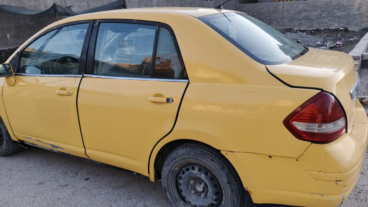 فيرسا مديل 2009 محرك 1.8 محرك كير حاوية رقم نكليزي باسمي سنوية لل 2029 هزة ماساقطة  مصفرة هيئة وغرامات بيها نواقص بسيطات مكان السيارة المسيب السعر 40 وبيها مجال *********** وتساب
