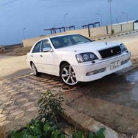 ٢٠٠٣ • ابيض صدفي • ارضية جلد