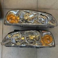 زوج لايتات اصلي تفصيخ حاوية النترا موديل ٢٠٠٣ الى ٢٠٠٦ سعر ١٠٠ الف  بك...