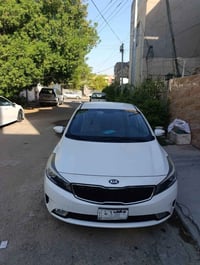 سيراتو ١٧ خليجي محرك ١٦٠٠  بغداد ماشية ٥٦ يعني شبه جديدة  بيها بارد با...