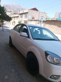 كيا ريو • سوران • بشرط