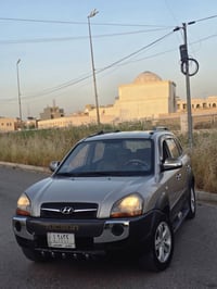توكسن 2009للبيع بدون قطره صبغ   ماشيه 119 الف كيلو متر تبريد ثلج بيها ...