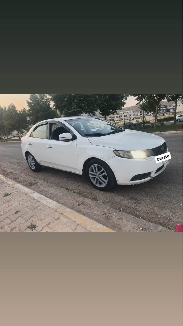 السلام عليكم 
كيا سيراتو موديل ٢٠١٣ مواصفات شاشه كاميره ٣ گير لايت زينون ساره رقم دهوك رقم صبوره سنوى يا خلاس بوى ساره يا پاقژو جاهزه مه كينه ١٨ گيرو مه كينه بشه رت ته بريد شه رت طه پ ره پو سنگو پشت شه رت هه ر چار تايره جديد ساره يا پاقژه و بى مه صره فه ساره حه رف L صبغه په راشوت كپس نه ڤه بوينه وه كى دى ساره جاهزه غرامه نزيكى ٥٠٠$ تحويل ژى بشه رت ساره يا صافيه سعر ٧٥ و مه جال ئه و ره قه مى خودانى ژى *********** دهوك, العراق

