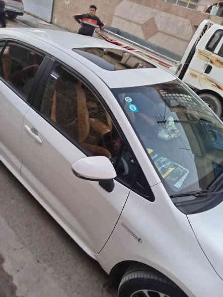 كورله هايبرد 2024 ماشيه 23 مكفوله بس مكانات بارد ***********  بغداد سعر 145
