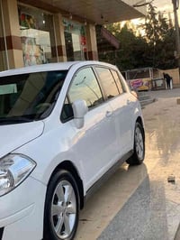 Nissan Tida. 2013  مەکینە ١.٨ بێ بۆیاخ  ٣ پەڵە ساردی هەیە  رەقەم و سەن...