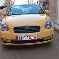 اكسنت موديل 2010وارد امريكي سياره ليبل واحد كلها بيها ضرر باب الي وره ...