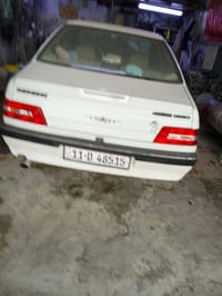 سياره بيجو 405 موديل 2009 للبيع  رقم الانكليزي الجديد مكينه بيهه جديده...