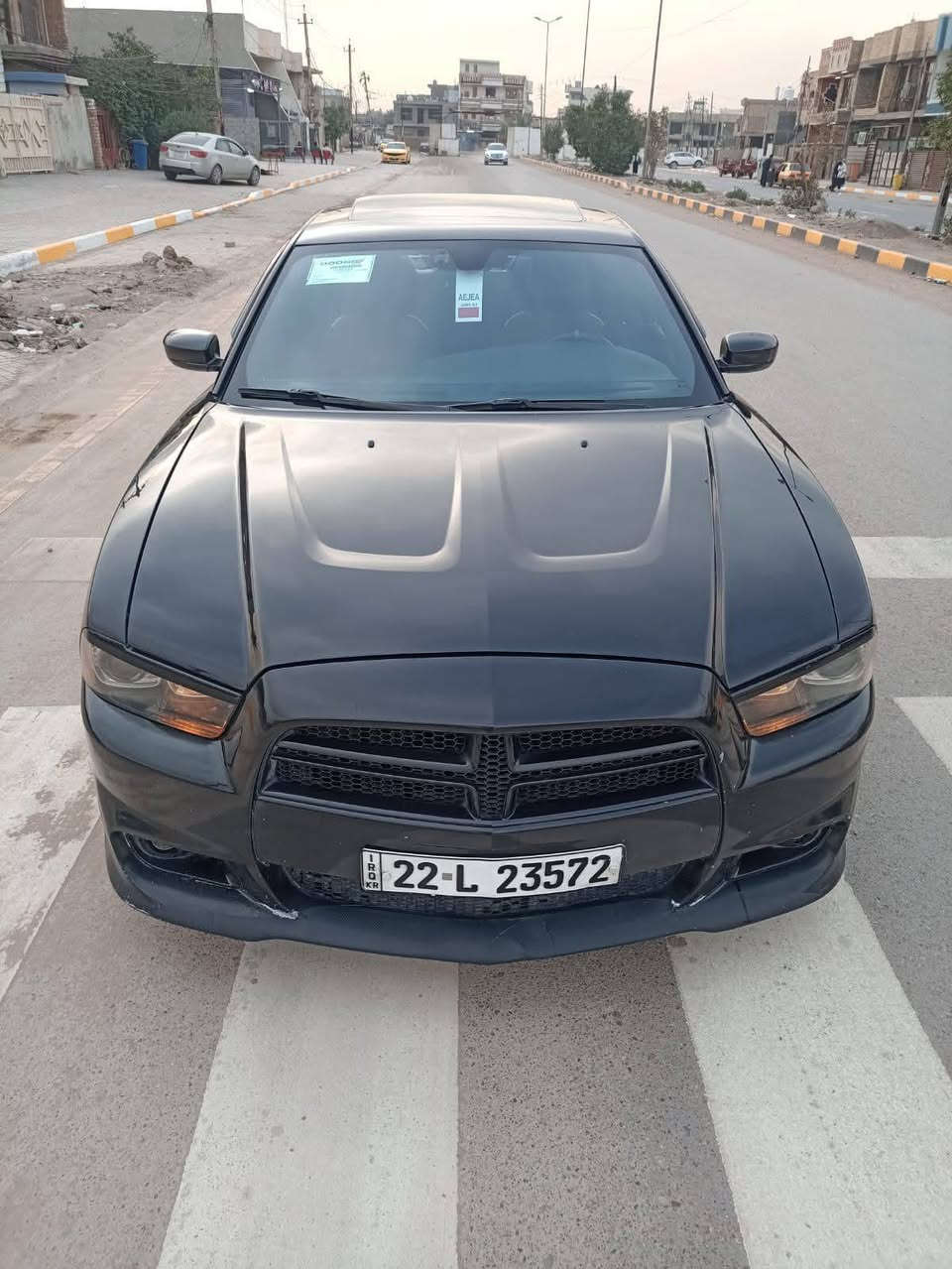 جارجر 2012 ( خليجي ) 
كفالة من الصبغ والضربة والتبديل فقط بارد بيها مكانات وبيها سونار 
فول مواصفات 
فتحه 
بصمه 
شاشه كبيره 
كير طياره 8 نمر 
تبريد قطعتين 
كلاصات تدفئه تبريد 
تدفئه كشانات 
بصمت ابواب 
كامره خلفيه 
كشنات جلد احمر بلادي 
داخل احمر وسود  
داعاميات SRT + دفيوزرات جانيبه 
تخم تاير جديد 
مكينه كير خير من الله 
صدر امامي خلفي قبل سبوعين بدلته 
منضومه زنون ام 400 دولار 
مكان السيارة بغداد الغزالية 
السعر 160
***********
