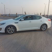 اوبتيمه • ٢٠١١ • تبديل باب السائق