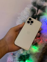 iPhone 12 pro max  ذاكره 256  بطاريه 88  نموذج m تك سيم  جهاز مامفتوح ...