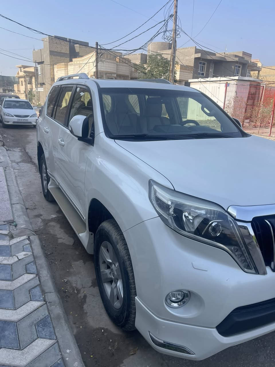 يرادو 2017 خليجي تم تنزيل السعر مستعجل ع البيع
سياره فول مواصفات TX.L المعروفة
رقم بغداد  بأسمي  تحويل مباشر
ماشيه 76 ألف كيلو 
محرك 6 سلندر  4000 
فتحة سلايد كشنات مخمل بعدها على نظافة البلاد
سياره حيل جديده بيها بس بارد بالجاملغ الخلفي جهة السايق  
السعر 350 وبيها مجال  بسيط ماكو هجي سعر بهاي النظافة و الممشى 
***********
مكاني السماوة
