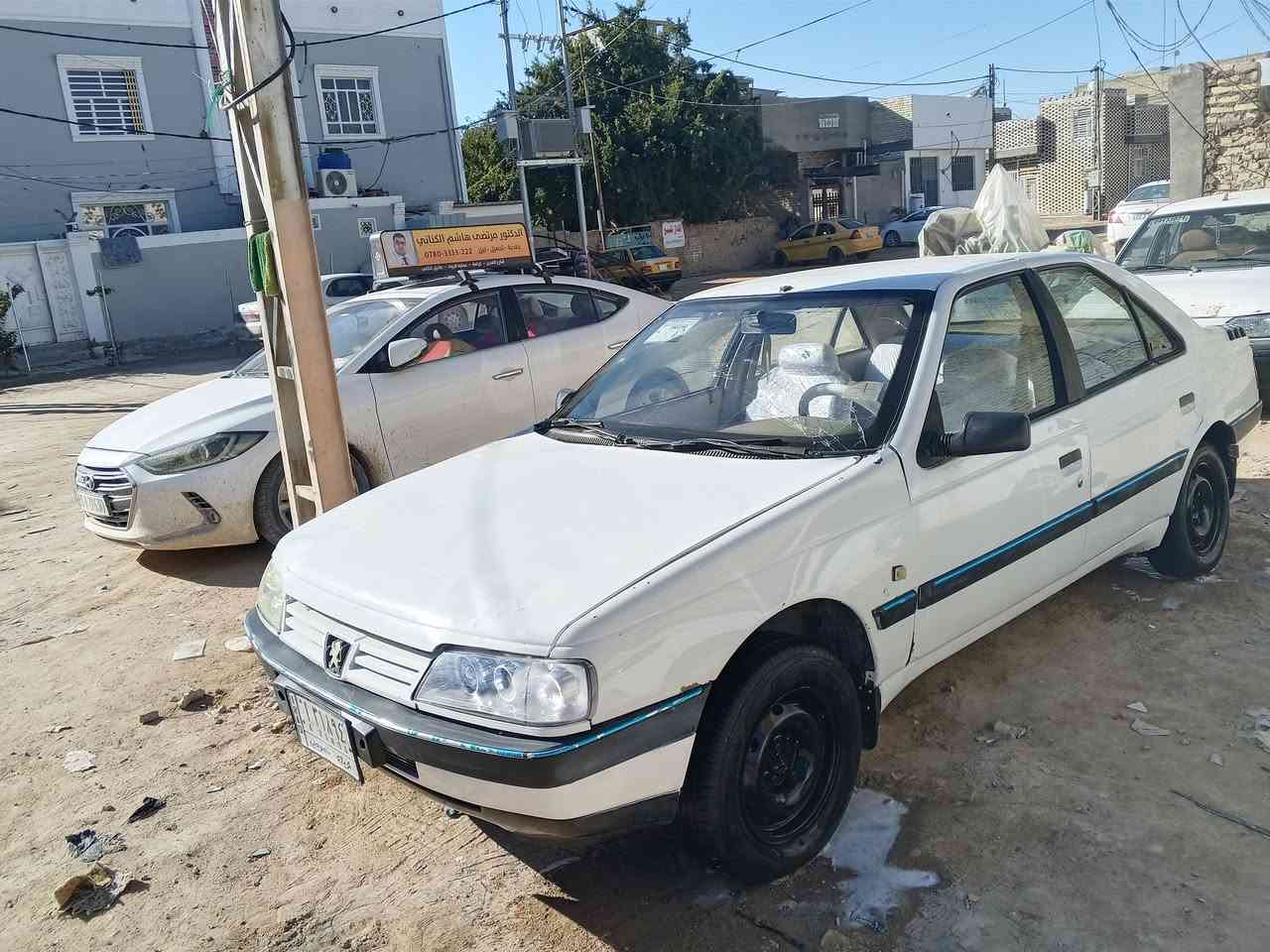 بيجو 405للبيع 209سياره كله جديد كير مكينه تخم تاير كله جديد السعر30وبيه مجال رقم كربله الماني وهذه رقمي***********
