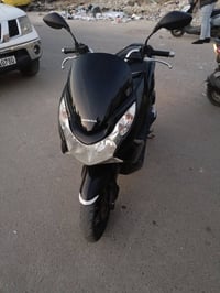 دراجه بي سي اكس • جيل اول • دراجه ناريه