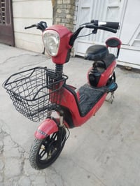 دراجه شحن نضيفه وكامله كلشي شغال حجم 14 وياه شاحنه وبصمه وسويج  السعر ...