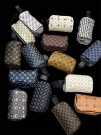 شنطة يد رجالية • جلد أصلي • ضد الماء