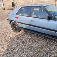 مازدا 323 جاهزه كير محرك صدر سنويه خضره وكاله وتحويل بيع سريع السعر 13...