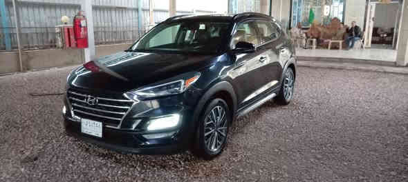 السلام عليكم للبيع هونداي توسان موديل 2021 وارد امريكي الضرر تبديل جاملغ فقط سياره  رقم بغداد باسم داور ثاني يوم السياره فول مواصفات للاخير واحد على واحد سياره تخم تواير حداديه شرط، محرك 2400 السياره ست كاميرات رادارات كشنات جديد كشن كهربائي تدفئه كشنات صندوق كهربائي تبريد قطعتين بصمه مثبت سرعه قيادة( رقم الهاتف)(***********)
