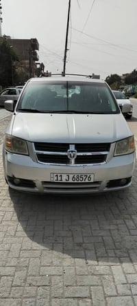 دوج كرفان ٢٠٠٨ محرك ٣٨٠٠  ابواب كهرباء و كشن السائق كهرباء و جام ٦ كهر...