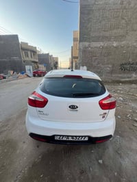 كيا ريو 2013  امريكي رقم ذي قار حادث جاملغ وباب  السيارة باسمي موصفات ...