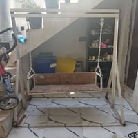 مكينة خياطة • مرجوحة أطفال