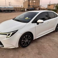 كورلا هايبرد 2024 شكل الامريكي  فول للاخير  ماشيه 50 الف رقم بغداد الإ...