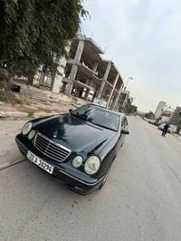 مرسيدس ام عيون e320 موديل 2000 فول مواصفات اللون زيتوني والداخل جلد اس...