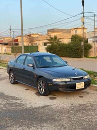 مازدا ٩٧ • مكينة شرط • ويل رياضي