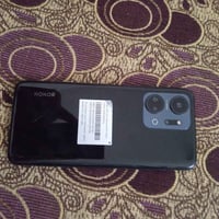 هاتف هونر x7a ذاكره ١٢٨ البطاريه 6000 مل امبير الجهاز مكفول بس بي كسر ...