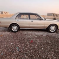 سيدان ذهبي • رقم دولي بغداد • تايرات جدد