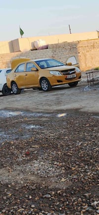 سياره جيلي أم كي مديل ١٠ سياره مصفره هيه وغرامه مكان سياره بغداد البيا...