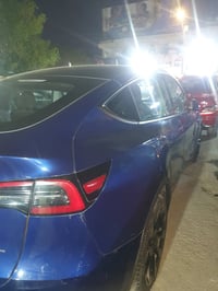 تسلا y 2023  لونك رينج دبل ماطور ماشيه 25 الف  دخول جديد رقم بغداد بسم...