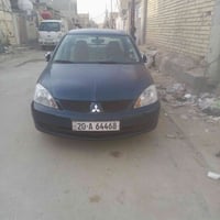 لانسر بومة 2010 الرقم ديالى مكان السياره بغداد  مكينة 2000  السيارة بل...