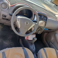نيسان سني هندي موديل 2020 ماشية 96 الف  مكفولة عدا رصعة بسيطة باب سائق...