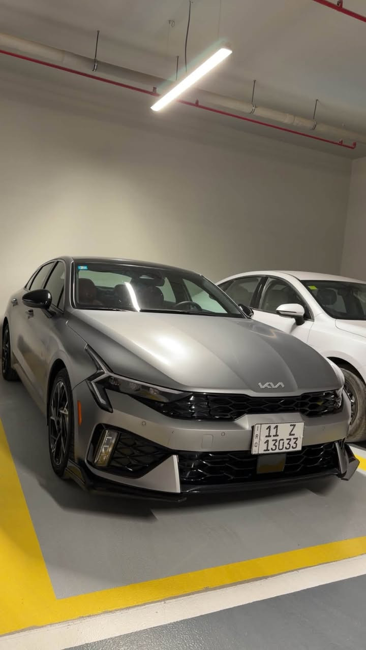 Kia K5
🚘 **2025 KIA K5 GT-Line** 🚘

🔹 **معلومات السيارة**

• الموديل: 2025

• الفئة: GT-Line (فل مواصفات 1/1)

• اللون: رصاصي  مات

• رقم بغداد جديد – تحويل مباشر

• المسافة المقطوعة: 27.000 كم

• المحرك: 2.5L (4 سلندر)

• وضعية السيارة: شركة (كبس)

🔹 **المواصفات والتجهيزات**

✅ فتحة سقف بانوراما

✅ مفتاح ذكي (Keyless Entry)

✅ بصمة أبواب

✅ بصمة تشغيل

✅ تشغيل عن بعد (Remote Start)

✅ شاشة عدادات ديجيتال كاملة

✅ شاحن لاسلكي (Wireless Charger)

✅ كاميرا خلفية

✅ فرامل إلكترونية (Electronic Parking Brake)

✅ Auto Hold

✅ Auto Start / Stop

✅ سماعات BOSE الأصلية

🔹 **أنظمة السلامة والمساعدة**

✅ رادار أمامي (المحافظة على المسار)

✅ رادار النقطة العمياء (Blind Spot Monitoring)

✅ رادار خلفي للتحذير من الاصطدام

✅ حساسات أمامية

✅ حساسات جانبية

✅ حساسات خلفية

🔹 **أنظمة القيادة**

✅ ECO Mode

✅ NORMAL Mode

✅ SPORT Mode

🔹 **المقصورة الداخلية**

✅ داخلية لون أحمر مميزة

✅ مقاعد جلد فاخرة لون احمر 

✅ مقاعد كهربائية

✅ تدفئة مقاعد

✅ تبريد مقاعد

✅ تدفئة المقود

✅ تحكم كامل من المقود

✅ تبريد مركزي

🔹 **الإضاءة والتجهيزات الخارجية**

✅ أضواء أمامية LED عدسة

✅ أضواء خلفية LED

✅ جنطات كروم أصلية

🔹 **تفاصيل الحادث**

✖️ دعاميه اماميه صبغ فقط

السعر :23.500$

💎 **سيارة نظيفة جداً، GT-Line فول مواصفات، جاهزة للفحص بأي مكان.**

📞 للاستفسار: ***********
***********

📍 العنوان: بغداد / المحموديه
