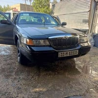 كراند ماركيز ٢٠٠١ للبيع مرقم دولي بغداد مكانها بغداد للاستفسار٠٧٩٠١٥٧٢...