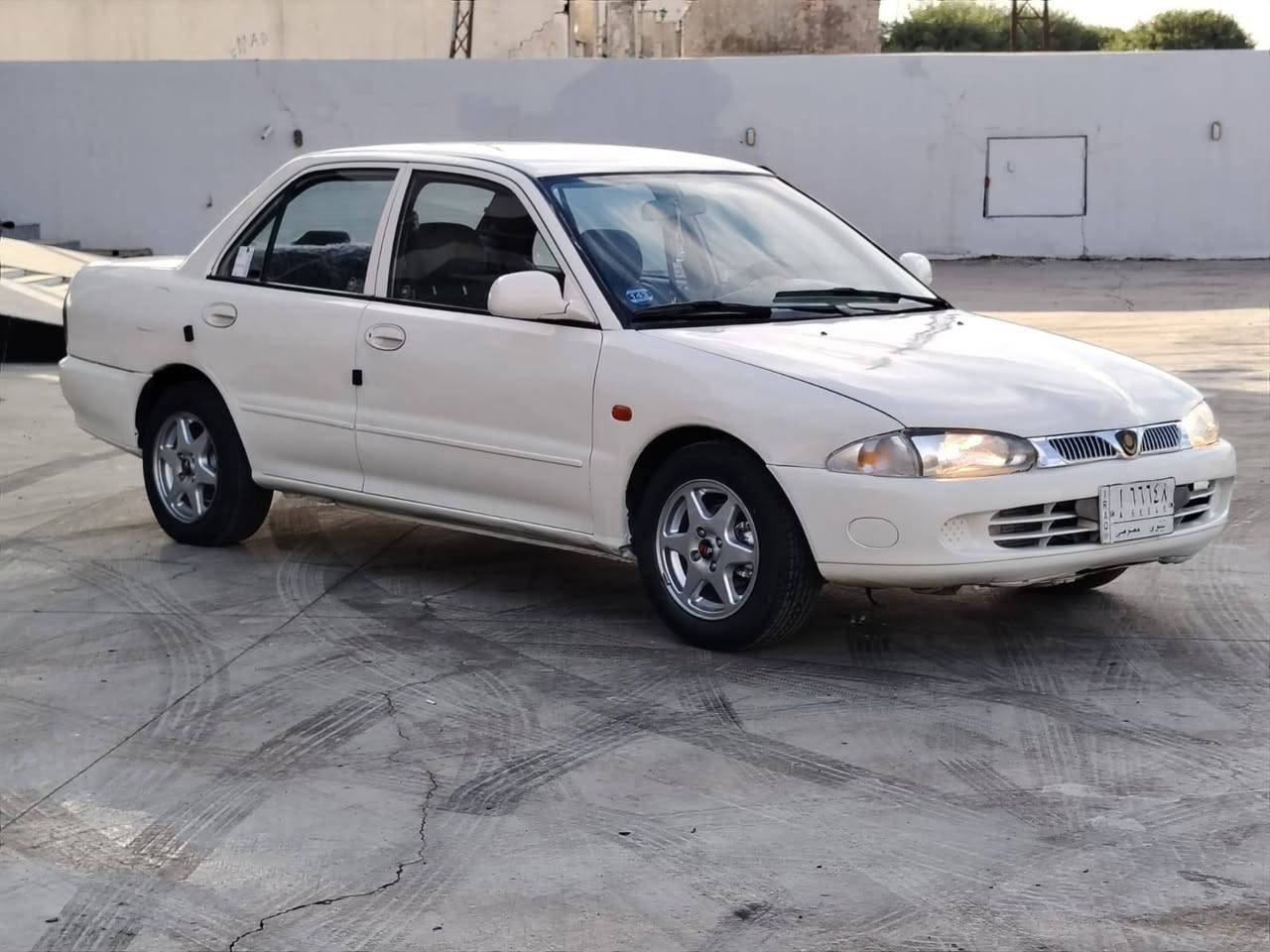 السعر 53$$           *********** 
بروتون موديل 2005 مكينه كير شرط تبريد شغال توماتيك جامات كهرب صبغ جاملغ خلفي رقم نينوى ألماني مشروع وطني شرعي موجود شرط التحويل
