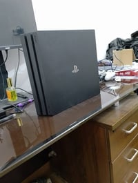 بلايستيشن 4 برو • مهكر 12.2 • مع العاب وملحقات