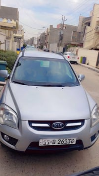 سبورتج 2010 رقم بغداد إنكليزي باسمي لسيارة جاهزه ما بيها اي نقص مصبوغ ...