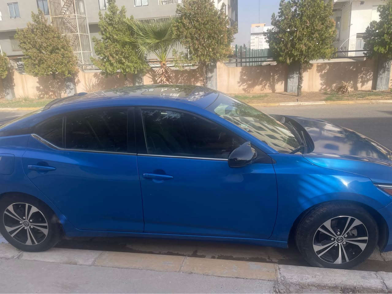 نيسان سنترا midnight موديل : 2021  
وارد 🇨🇦 كندي 
مواصفات SV plus
لون ازرق ببسي
ممشى : 49000 ml

ترقيم اربيل جديد - تواجد اربيل
شرط التحويل 

هزة جديد 

حجم المحرك : 2.0L ( 4,سلندر ) 

ايرباك مرجع سستم
كلة ع وضع الشركة
حادث ربع البونيد و بونيد مبدل
و بارد شبر من الجامرلخ
المواصفات : ‏‎

فتحة سقف  سلايد
بصمة ابواب 
‏‎بصمة تشغيل 
‏‎شاشة كبير ‎
رادارات مع تحديد مسار
استيرن هزاز عند الخروج عن المسار 
كاميرة خلفية 
‏ (التحذير من الاصطدام) 
مع بريك اوتوماتيكي خلفي ( توقف ذاتي ) 
نظام : Eco
نظام : Normal
نظام : Sport
تحكيم ستيرين فوول
تربيد بيانو
كشنات تدفئة
ويل كروم
وبعد هواية مواصفات
للسعر 
 الاتصال على
***********
*********** أربيل, العراق
