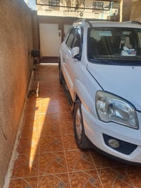 كيا اسبورتج موديل ٢٠٠٩ قطرت صبغ مابيهه السياره مال بيت رقم جديد وهزه ج...